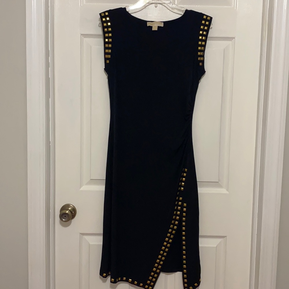 Black sleeveless stretchy dress with studs